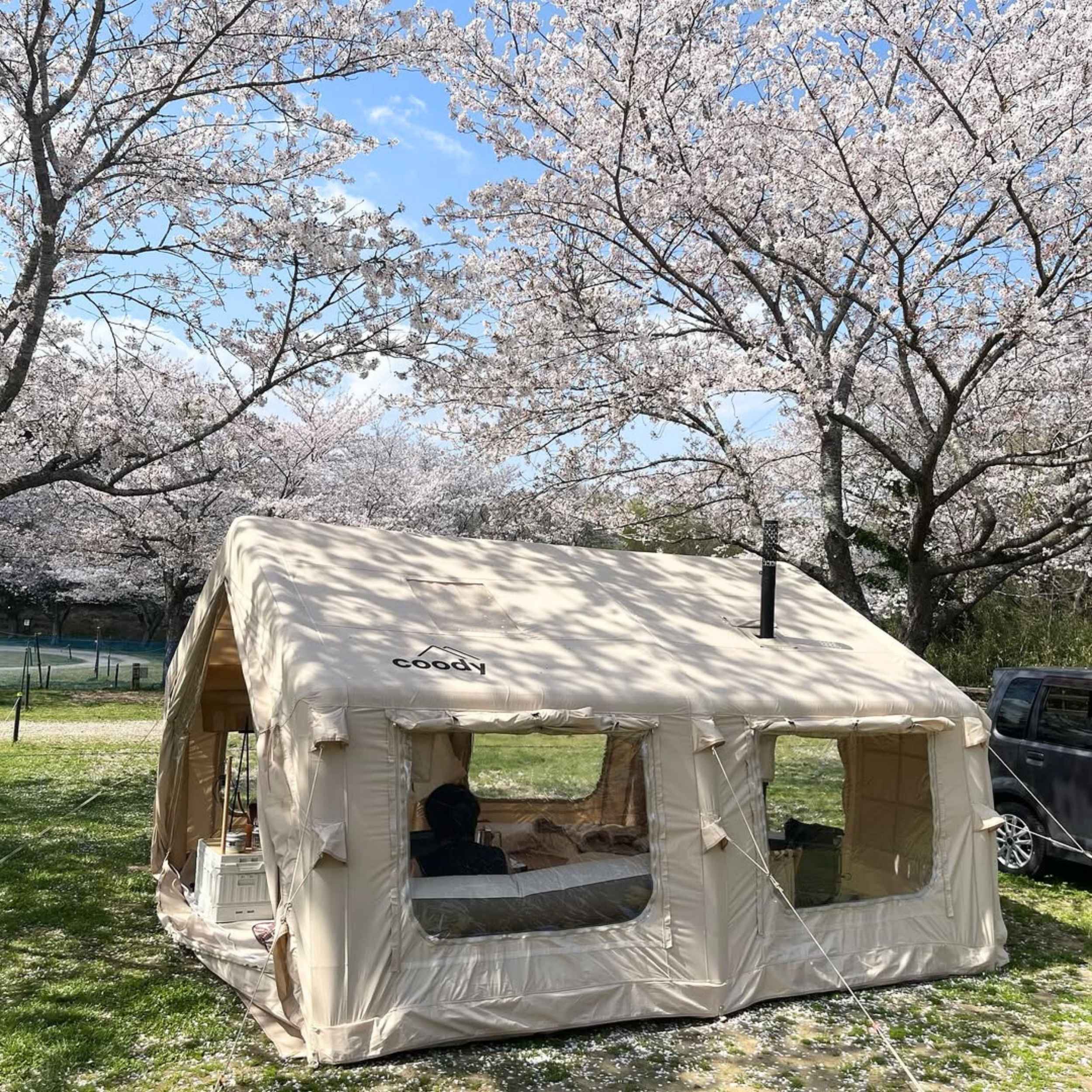 Coody Familia AirTent 13.6 Beige (2-10 Person) + RBM Wood Stove Caminus M